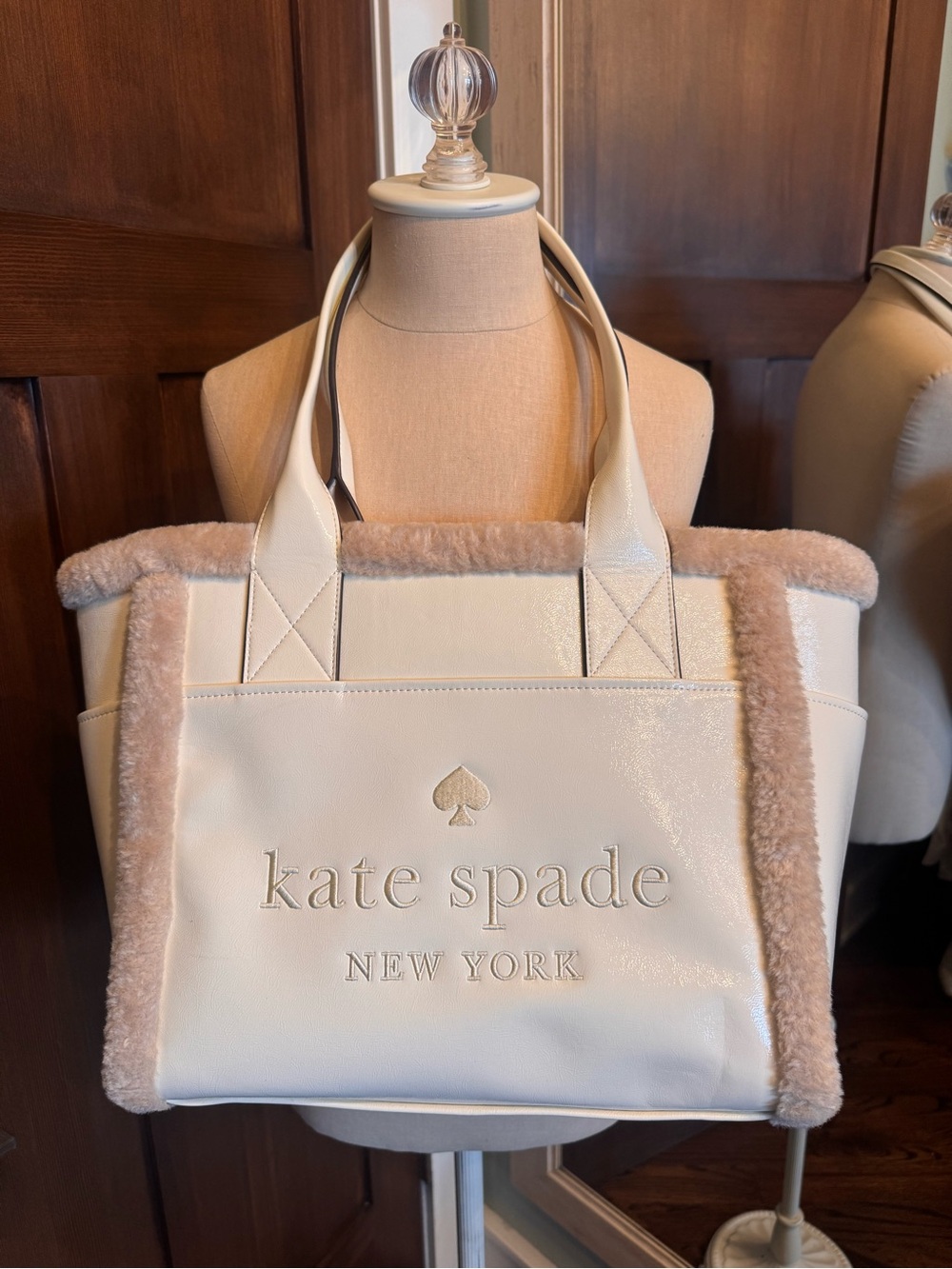 Kate Spade cream patent leather tote with shearling trim